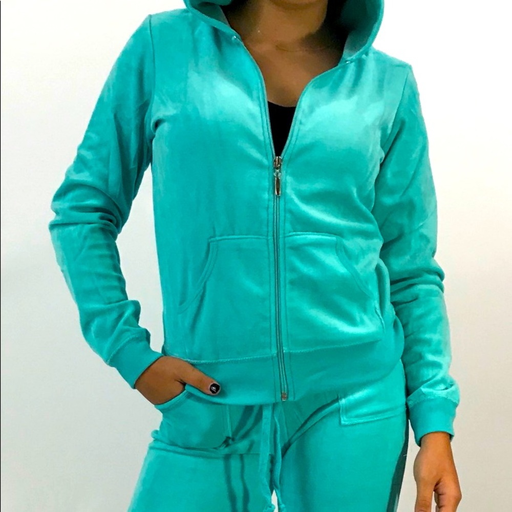 Velour jumpsuits in four different colors. Sizes run small. All brand new.
